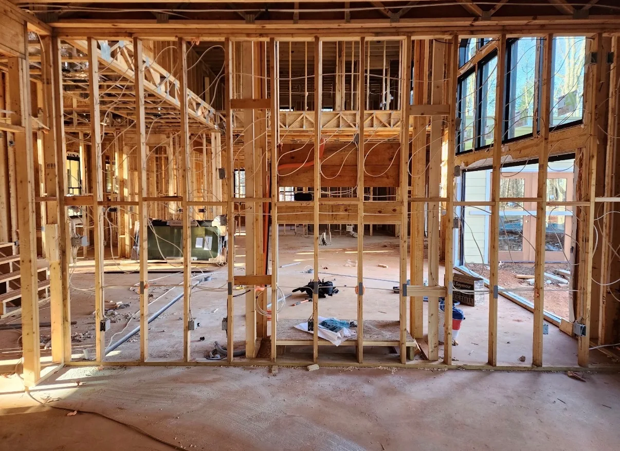 Electrical boxes and wiring within residential wall framing.